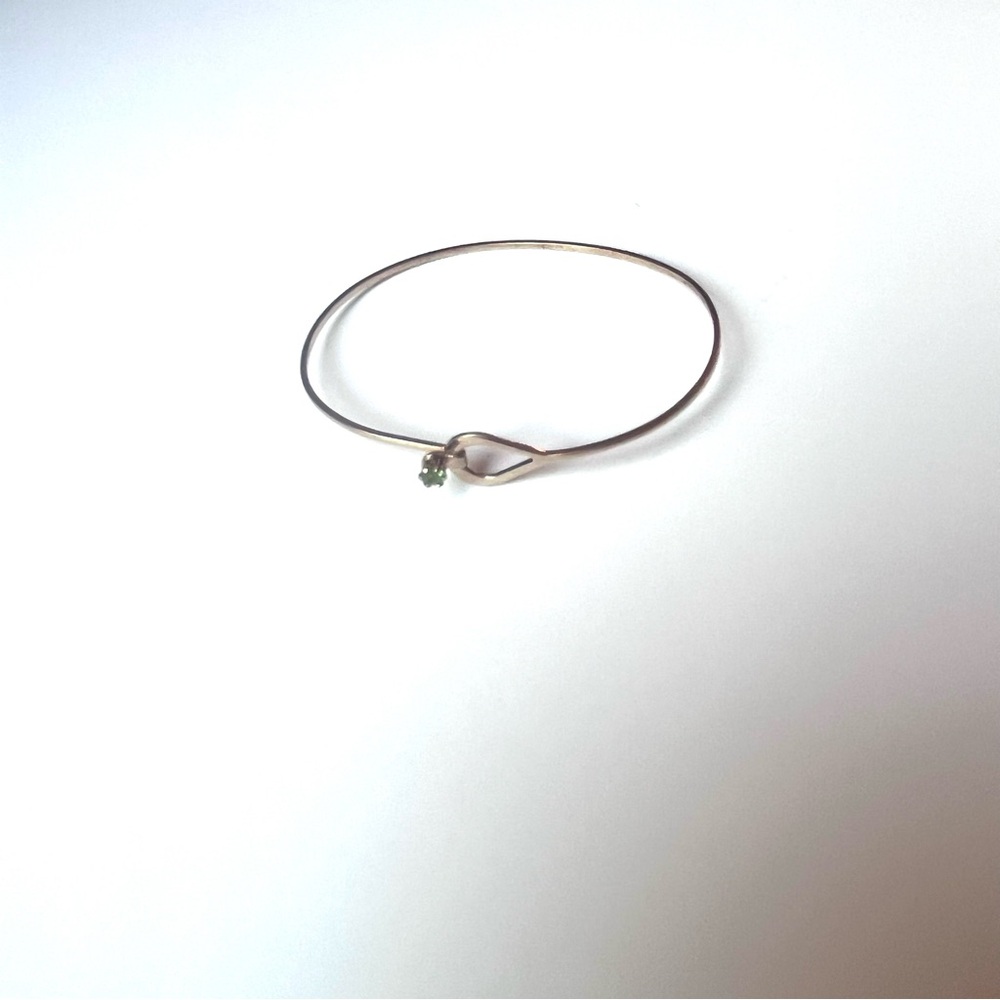 Elegant Gold Bracelet with light green stone